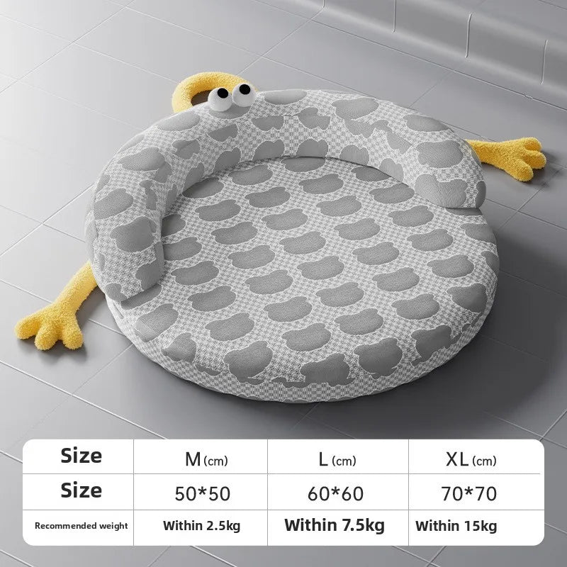 The KittyNook Cat Co. Ice Silk Cat Nest is a round gray bed with yellow arms and googly eyes, shown by a size chart.