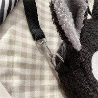 Thumbnail for Close-up of a metal clasp securing the black strap to a fuzzy gray KittyNook Cat Co. Neko Soft Cat Shoulder Bag.