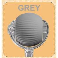 Thumbnail for A grey, pet-safe silicone cover protects the Smart Rolling Cat Ball by KittyNook Cat Co. on an orange 