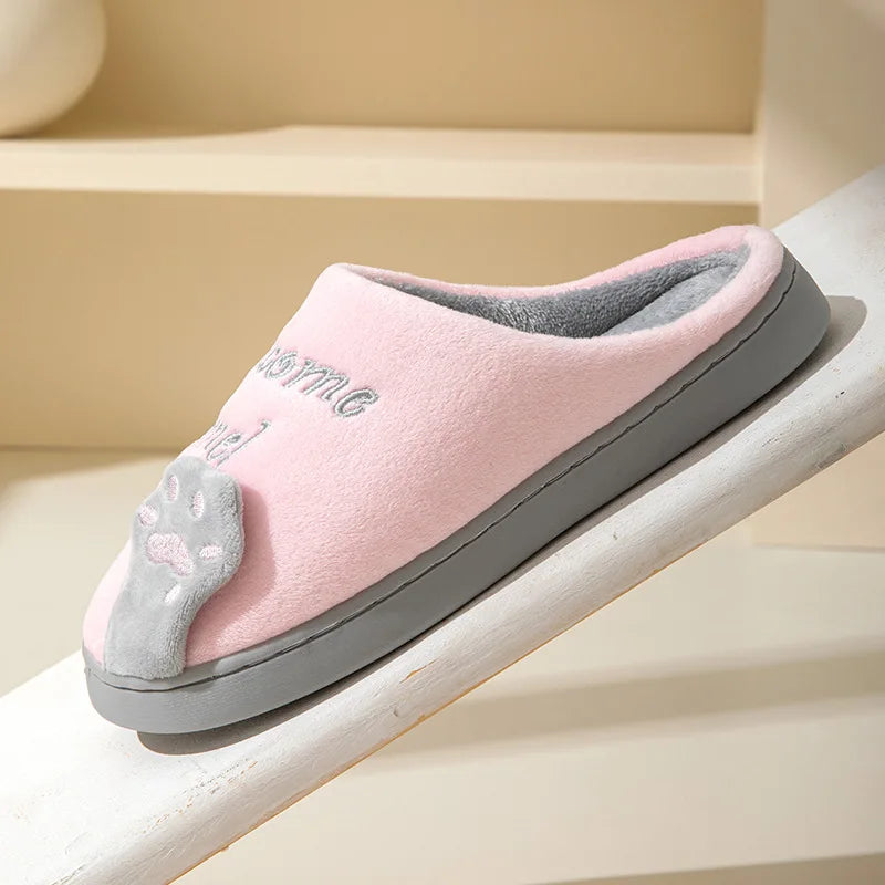 KittyNook Cat Co.'s Happy Pawprints Lucky Cat Slippers: pink and gray with paw design, cozy for home comfort.