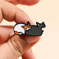 Thumbnail for A hand holds the Cute Feline Enamel Brooch by KittyNook Cat Co.—a perfect fashion pin for any cat lover.