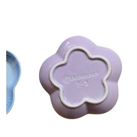 Thumbnail for A purple Extra Wide Raised Flower Cat Bowl by KittyNook Cat Co., seen from below with branding and 