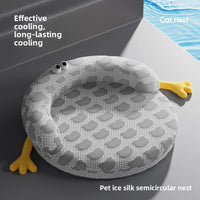 Thumbnail for KittyNook Cat Co. Ice Silk Cat Nest: round, gray, with yellow feet and cartoon eyes—cooling bed for pets by the pool.