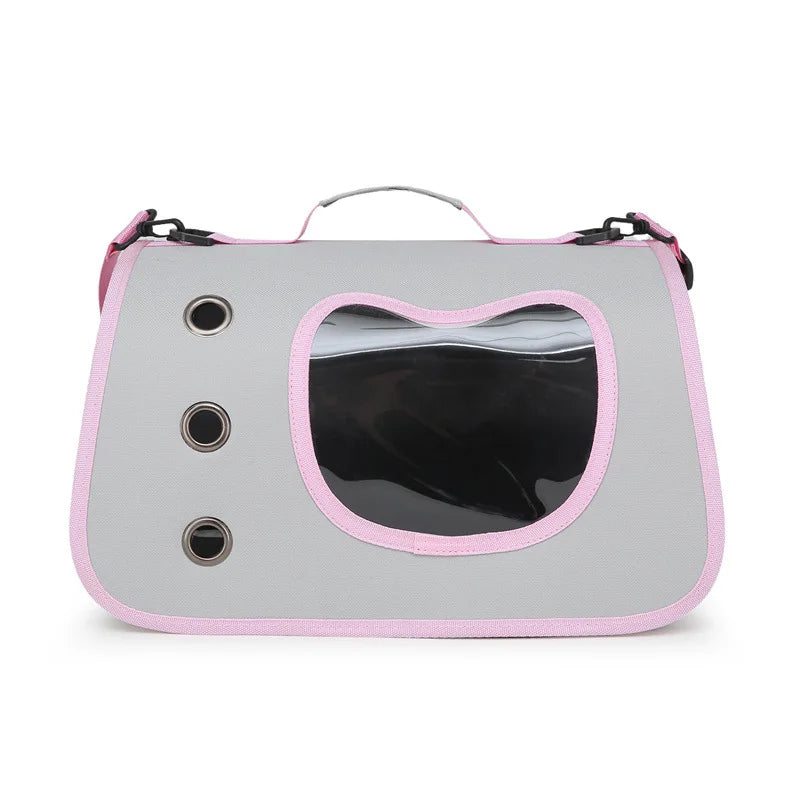 KittyNook Cat Co. Premium Foldable Small Cat Carrying Bag in gray/pink with window & 3 left-side vent holes.