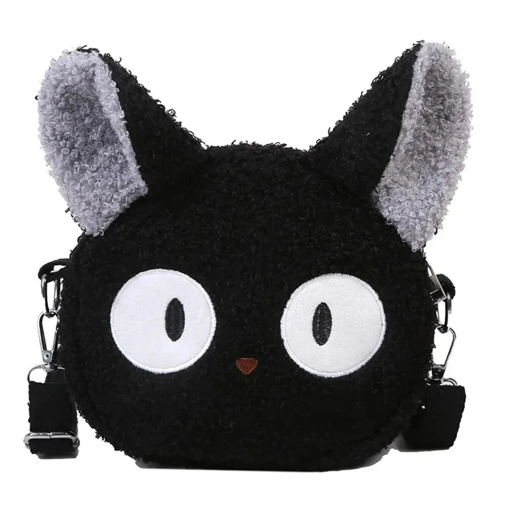 The Neko Soft Cat Shoulder Bag by KittyNook Cat Co. is a small, fuzzy kawaii purse with big white eyes and gray ears.