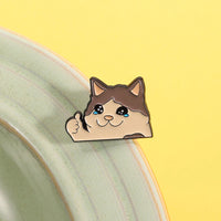 Thumbnail for Kawaii Thumbs Up Crying Cat Enamel Pin by KittyNook Cat Co. sits on a green bowl, yellow background cheers it up.