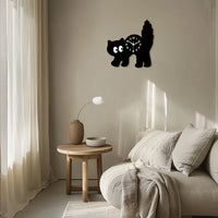 Thumbnail for A KittyNook Cat Co. Crystal Porcelain Black Cat Wall Clock hangs above a beige sofa and round wooden table in soft light.