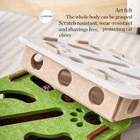 Thumbnail for The KittyNook Cat Co. Interactive Felt Cat Maze Puzzle Box is shown on a carpet with balls inside.