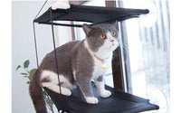 Thumbnail for Gray and white cat on KittyNook Cat Co. Space-Saving Double Hanging Pet Bed, gazing outside alertly.