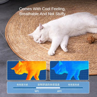 Thumbnail for A white cat lounges on the KittyNook Cat Co. Natural Rattan Cat Scratcher with a cooler-vs-warmer temp graphic.