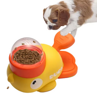 Thumbnail for A puppy steps on the KittyNook Non-Toxic Pet IQ Food Leak Tumbler to get kibble.