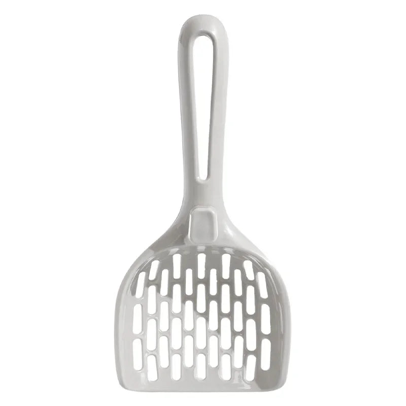 The KittyNook Cat Co. Curved Cat Litter Shovel features a slotted design and long handle for easy, odor-free cleaning.
