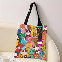 Thumbnail for The KittyNook Cat Co. Playful Kitten Print Canvas Handbag adds a vibrant touch to your eco-friendly shopping trips.