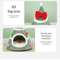 Thumbnail for The Christmas Tree Cat Mat by KittyNook Cat Co. features colorful pom-poms, a red bow, and a cozy entrance.