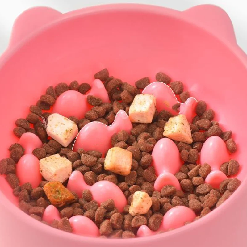 KittyNook Cat Co. Elevated Anti-Choke Slow Feeder Bowl with pink design and fish-shaped obstacles for feeding fun.