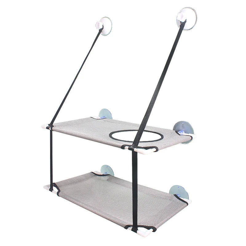 KittyNook Cat Co. Space-Saving Double Hanging Pet Bed: gray, window-mounted with suction cups and black straps.