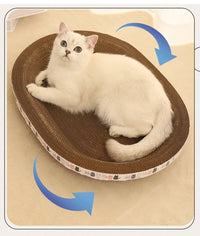 Thumbnail for White cat on KittyNook Cat Co. Oval Corrugated Cat Scratching Board with rotating, furniture-protecting design.