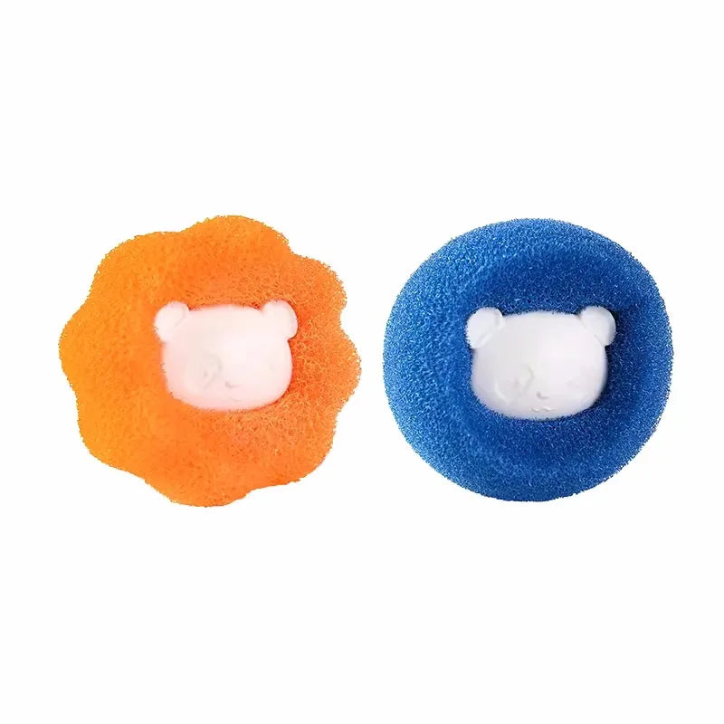 Two round Laundry Pet Hair Filters by KittyNook Cat Co., orange and blue, each with a white bear face at the center.