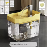 Thumbnail for KittyNook Cat Co.'s Transparent Cat Water Fountain with Auto Filter has a yellow cover and flowing spout.