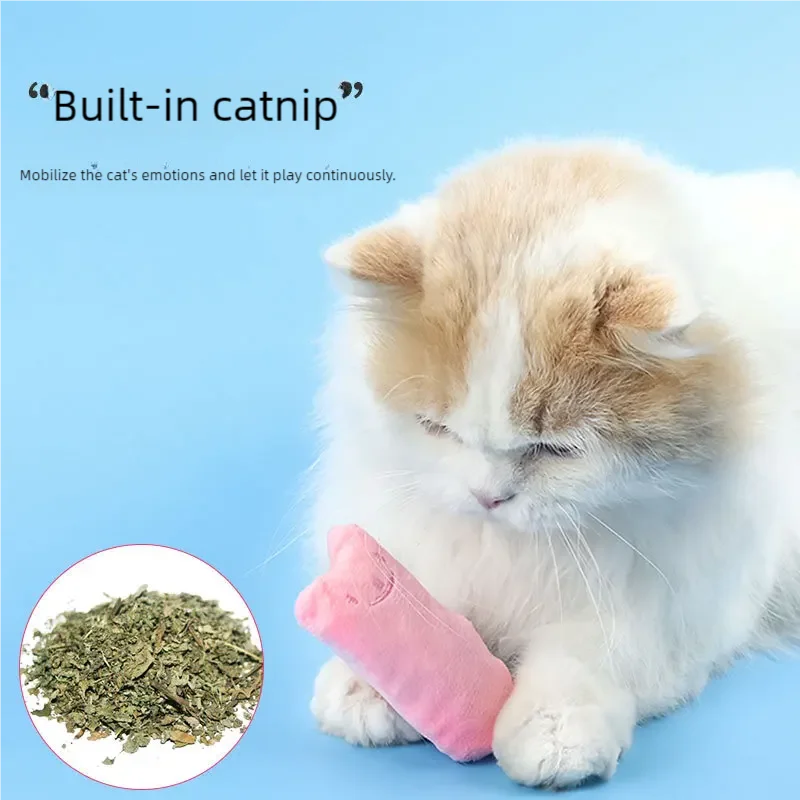 A fluffy cat plays with a pink Safe Catnip Chew Toy by KittyNook Cat Co.; "Built-in catnip" highlights boredom relief.