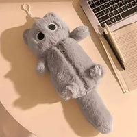 Thumbnail for The Kawaii Big-Eyed Cat Plush Pencil Case by KittyNook Cat Co. sits on a desk beside a laptop, notebook, and pen.