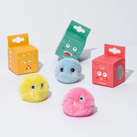Thumbnail for Three fluffy KittyNook Cat Co. Interactive Cat Smart Ball Toys with eyes, next to colorful cartoon-faced boxes—perfect for cats!.