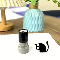 Thumbnail for KittyNook Cat Co. Black Cat DIY Journaling Stamp leaves cute imprints, ideal for scrapbooking decoration.