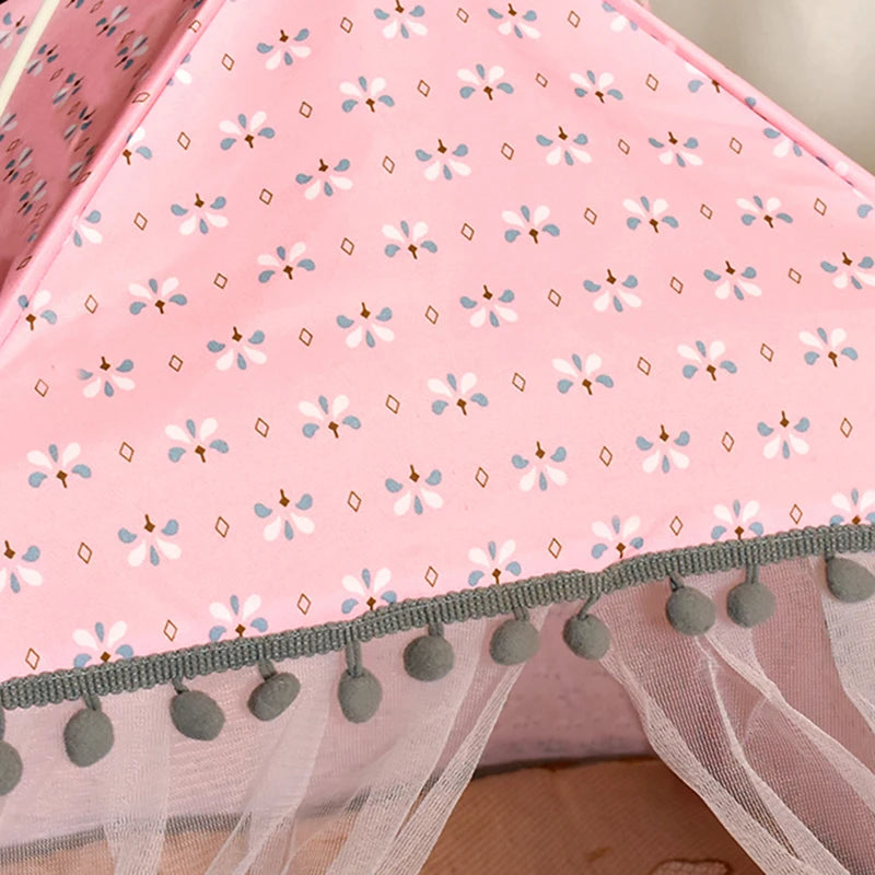 Close-up of the Serene Petal Semi-Enclosed Indoor Cat Tent by KittyNook Cat Co., featuring a pink floral design and mesh drape.