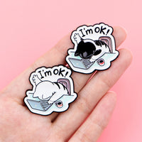 Thumbnail for The Cat at Work Enamel Brooch Pin by KittyNook Cat Co. lies on a laptop, making a cute office accessory.
