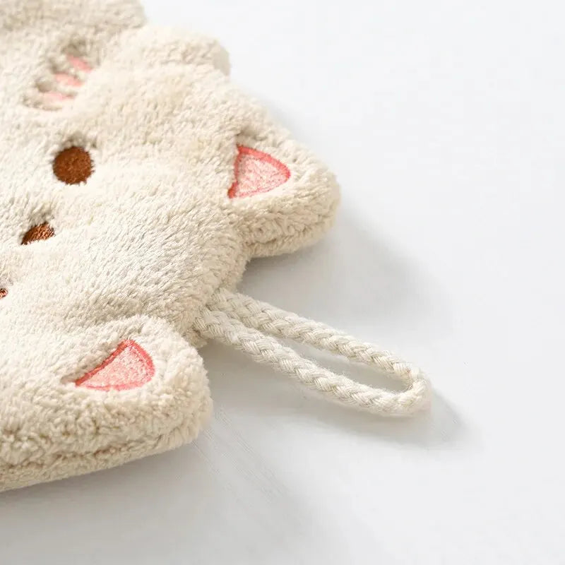 KittyNook Cat Co. Cute Cat Hanging Towel—cream, cat-shaped, embroidered face; ideal gift for any cat lover's home.