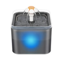 Thumbnail for KittyNook Cat Co. LED Automatic Pet Water Dispenser with Filter offers clean, fresh water with blue glow and flower spout.