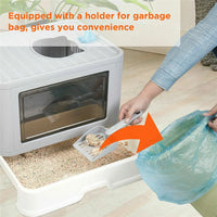 Thumbnail for A person scoops litter into a blue bag beside the KittyNook Cat Co. Purrfect Foldable Litter Solution with dual-entry.