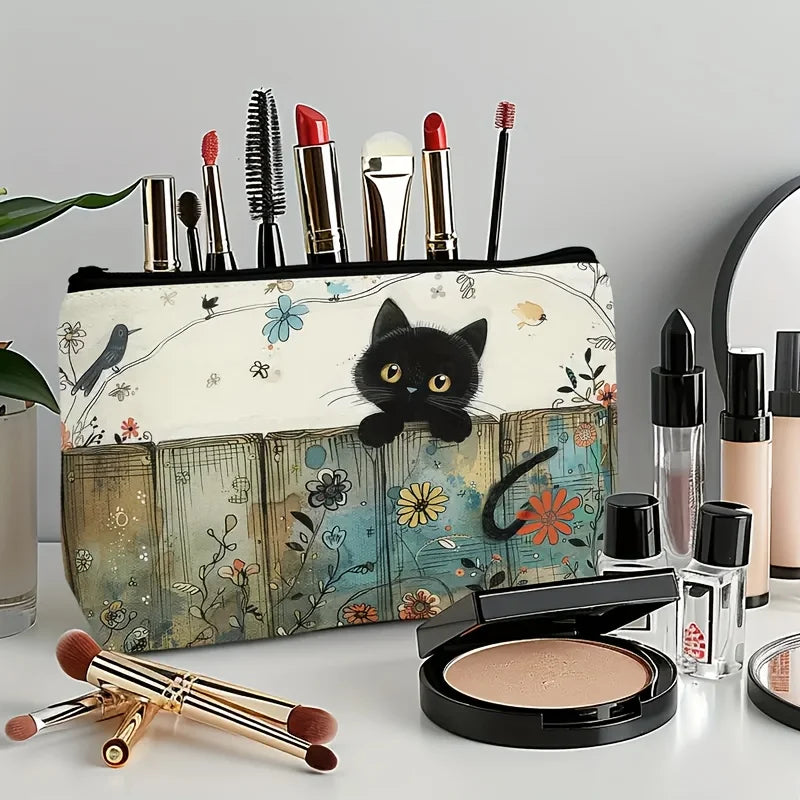 The Vintage Floral Kitty Makeup Pouch by KittyNook Cat Co. is perfect for storing your beauty essentials in style.