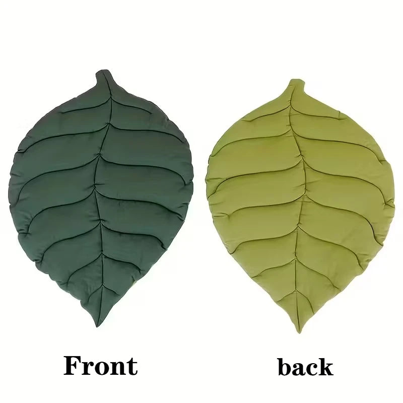Two leaf-shaped Leaf Pattern Cat Sleeping Mats, one dark green and one light green, labeled “Front” and “back.”