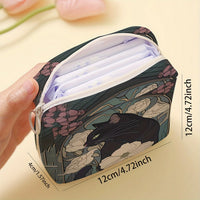 Thumbnail for A hand holds a KittyNook Cat Co. Cat Pattern Printed Sanitary Napkin Storage Bag (12x12x4 cm).