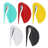 Thumbnail for Five KittyNook 2-in-1 Pet Knot Remover Grooming Combs, colorful and plastic, arranged on a white background.
