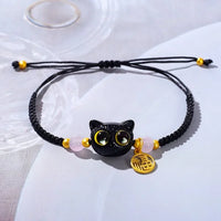 Thumbnail for KittyNook Cat Co. Lucky Charm Bracelet for Good Fortune features a cat face charm, pink and yellow beads, and gold pendant.