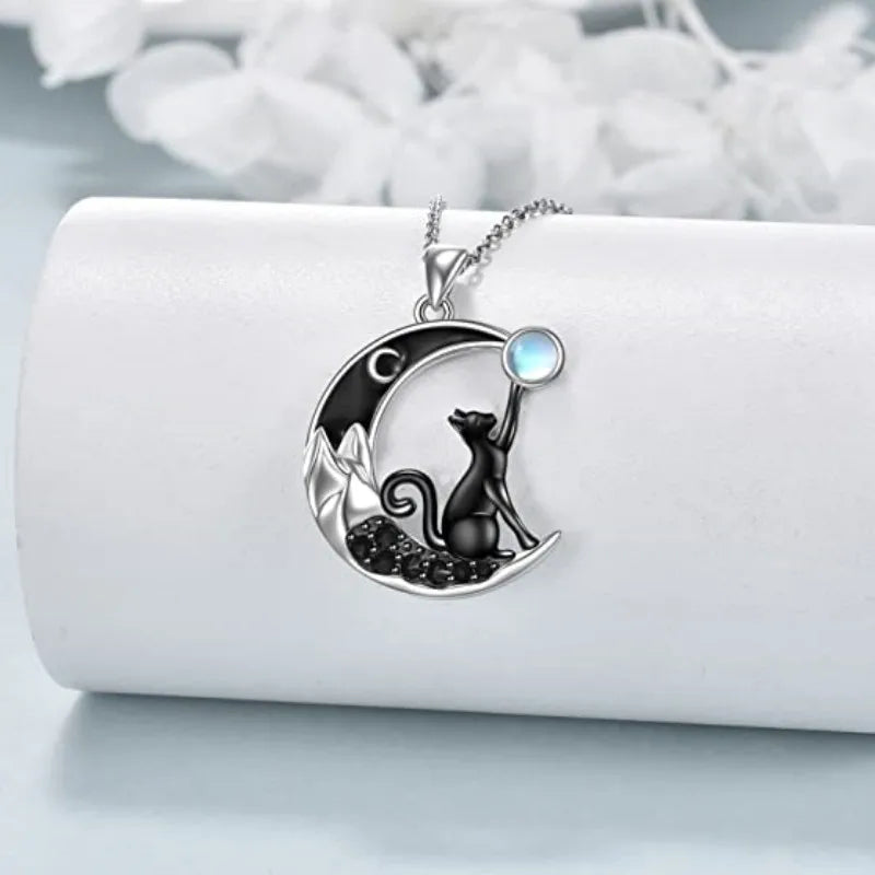 The Cute Black Kitty Moon Necklace by KittyNook Cat Co.—a perfect celestial gift idea for cat lovers.