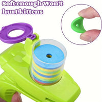 Thumbnail for A hand holds the Turnip Launcher by KittyNook with foam discs; 
