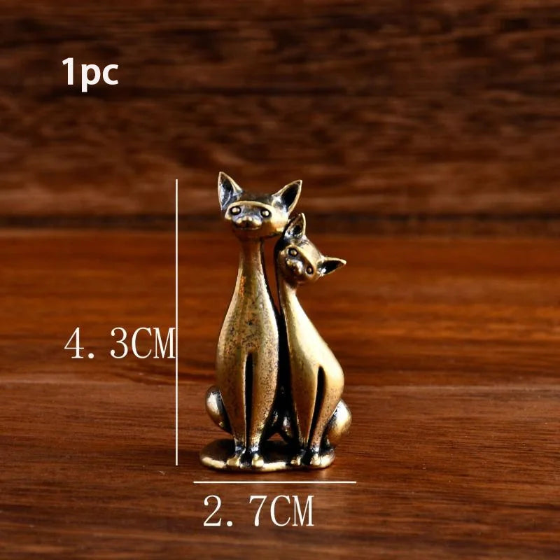 Intertwined Loving Cats Brass Sculpture by KittyNook Cat Co., 4.3 cm tall—meaningful art for any space.