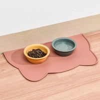Thumbnail for KittyNook Cat Co. Silicone Pet Feeding Bowl—two bowls on a spill-proof cat-shaped mat set near the wall on wood flooring.