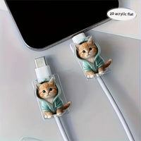 Thumbnail for Two MeowGuard Cat Cable Protectors by KittyNook Cat Co. in green hoodies keep your charging cables safe near your phone.