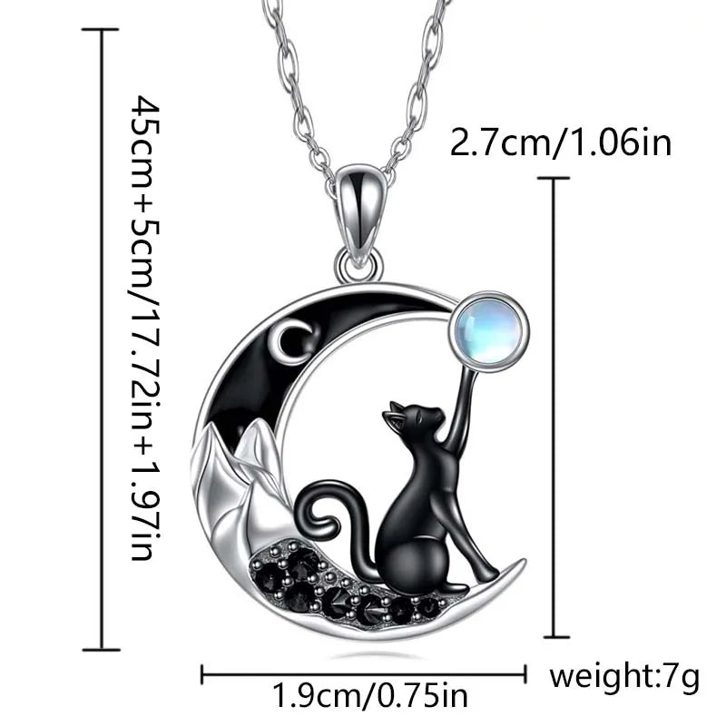 The Cute Black Kitty Moon Necklace by KittyNook Cat Co. is a perfect gift idea for cat lovers and celestial jewelry fans.