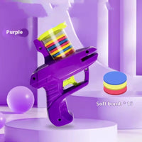 Thumbnail for KittyNook Cat Co. Turnip Launcher fires yellow, red, and blue foam discs—an interactive cat toy for endless fun!.