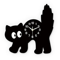 Thumbnail for KittyNook Cat Co. Crystal Porcelain Black Cat Wall Clock features wide eyes, numbers, and an upright tail for unique charm.