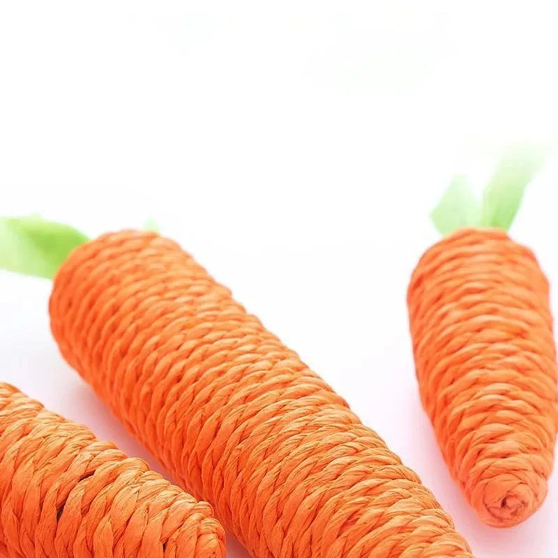 The Interactive Sound-Emitting Carrot Toy by KittyNook Cat Co. is a playful orange cat toy with green tops.