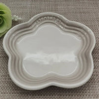 Thumbnail for KittyNook Cat Co. Extra Wide Raised Flower Cat Bowl on woven beige surface, green faux flower in top left corner.