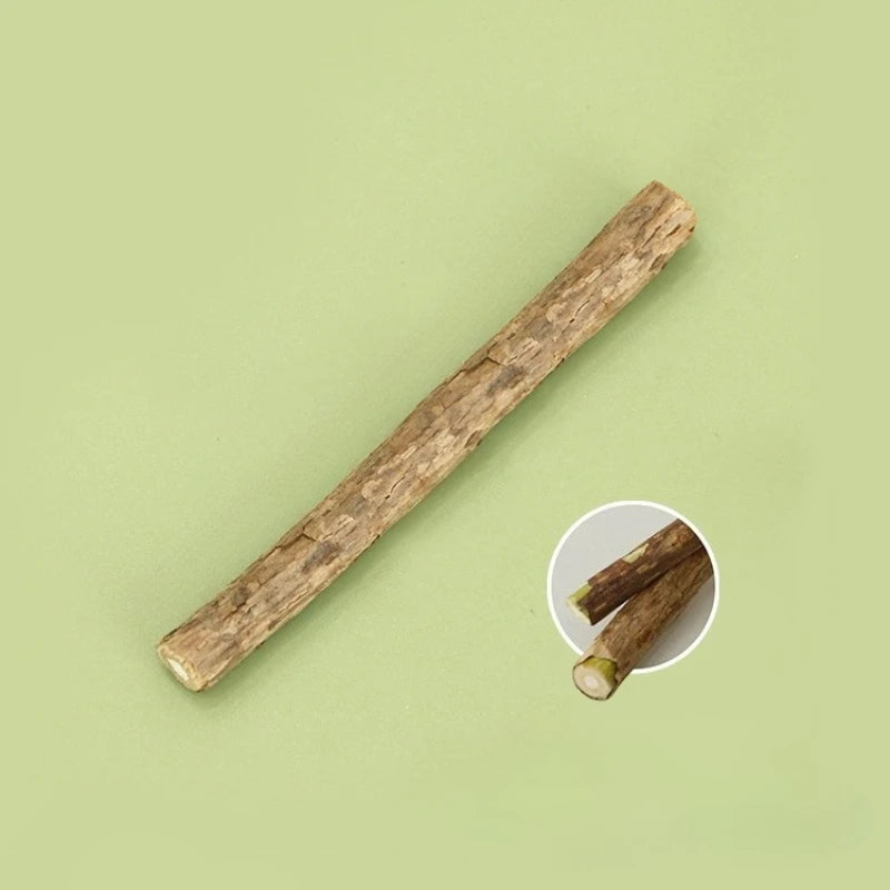 The Ultimate Kitten Teething Wand Toy by KittyNook Cat Co. shown on light green, with close-up of its textured brown ends.