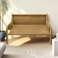 Thumbnail for A woven rattan bench with wooden arms sits near a KittyNook Cat Co. Cat Summer Sofa Bed in a sunlit room.