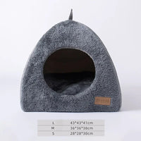 Thumbnail for KittyNook Cat Co. Cozy Triangle Cat Cave Bed—gray, plush, triangular, round entrance; sizes in cm below.